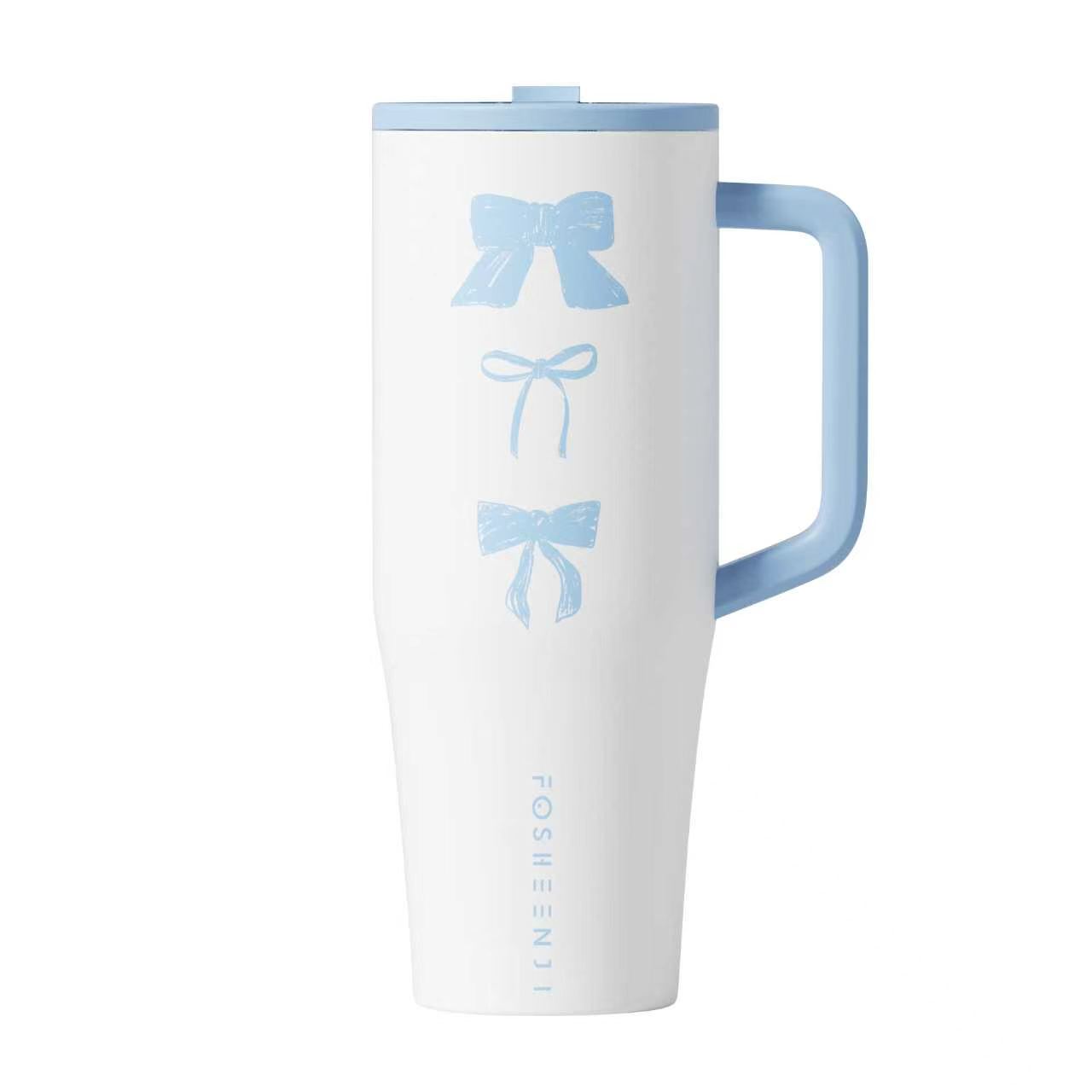 White tumbler with blue bow design