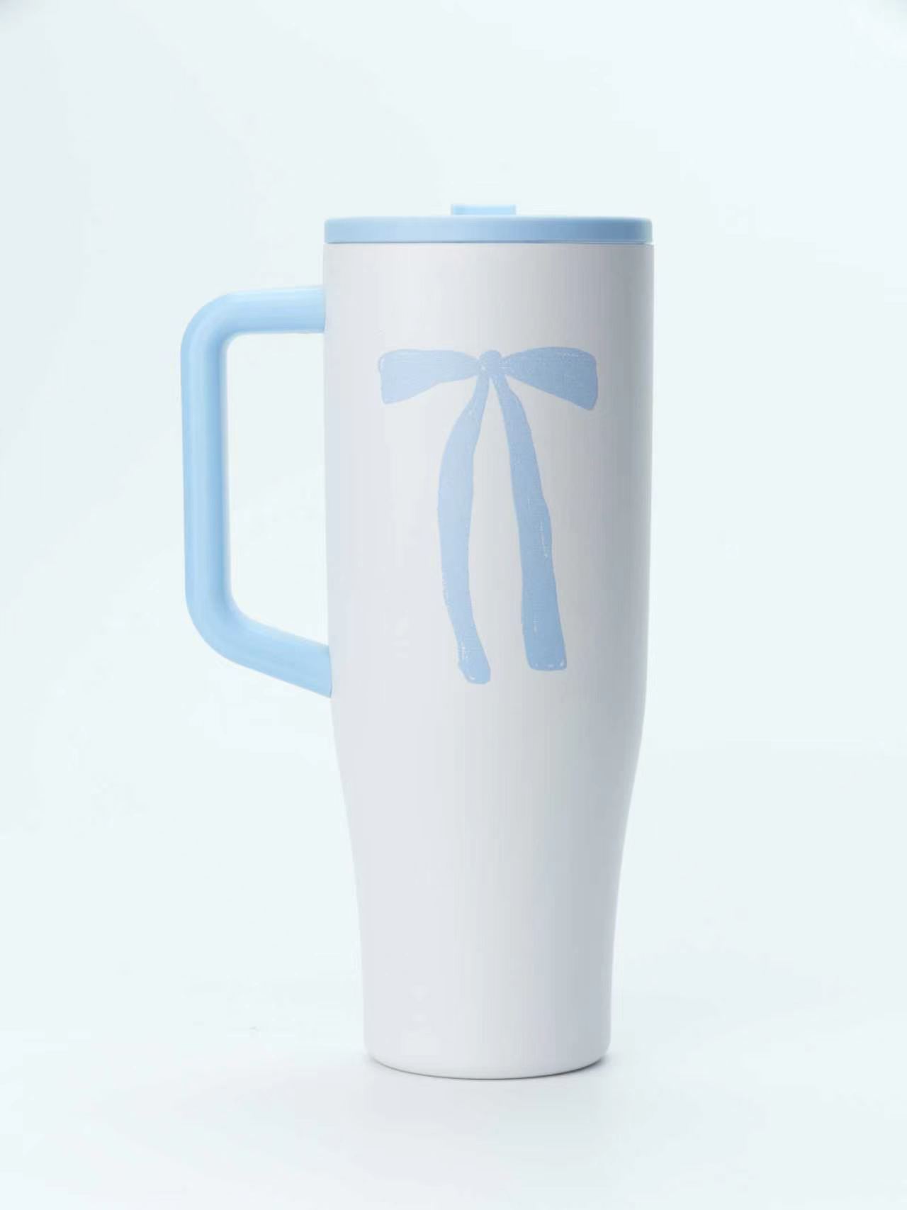 White tumbler with ribbon bow